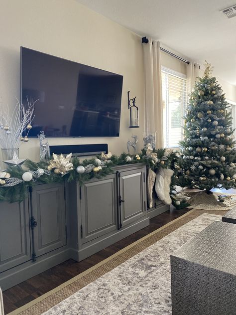 Christmas Garland Tv Console, Christmas Decor On Tv Console, Christmas Garland On Tv Stand, Garland On Entertainment Center, Media Console Christmas Decor, Tv Console Christmas Decor, Home Decor Tv Stand, Tv Stand Christmas Decor, Carolina Room