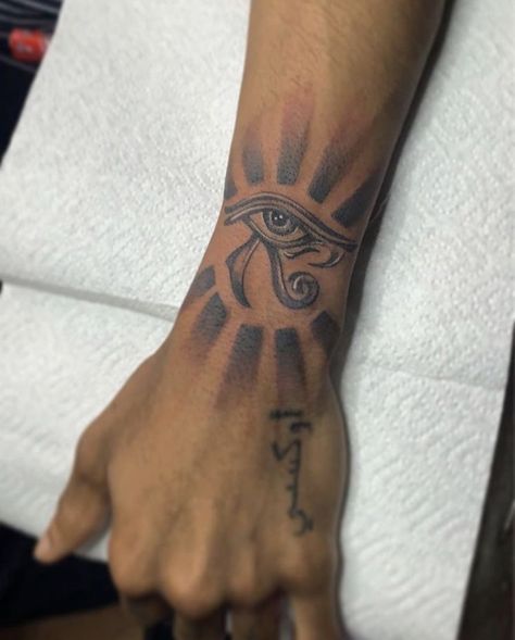 Forearm Wrist Tattoos Men, Men Tattoo Ideas Wrist, Wadjet Tattoo, Inside Of Bicep Tattoo For Men, Medium Hand Tattoos, Palm Size Tattoos Ideas Men, Mens Wrist Tattoos Ideas, Men Wrist Tattoo Ideas, Light Skin Tattoos