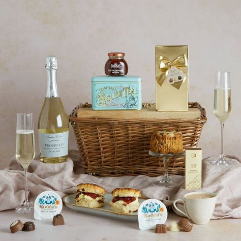 Send a traditional gift experience to delight the Mother you're celebrating this year. She'll find bliss in the true indulgence of delicious scones with strawberry preserve and Cornish clotted cream, served next to a heart-warming cup of traditional English afternoon tea. Say cheers to the special occasion with a glamorous flute of La Tenuta Sconta Prosecco, from the vineyards of Italy. The scones are followed by a rich fruit Dundee cake, alongside white chocolate-drizzled fudge and a Dundee Cake, Mother's Day Afternoon Tea, Strawberry Preserve, Scones And Clotted Cream, Afternoon Tea Hamper, Fruit Scones, English Afternoon Tea, Cassia Cinnamon, Strawberry Preserves