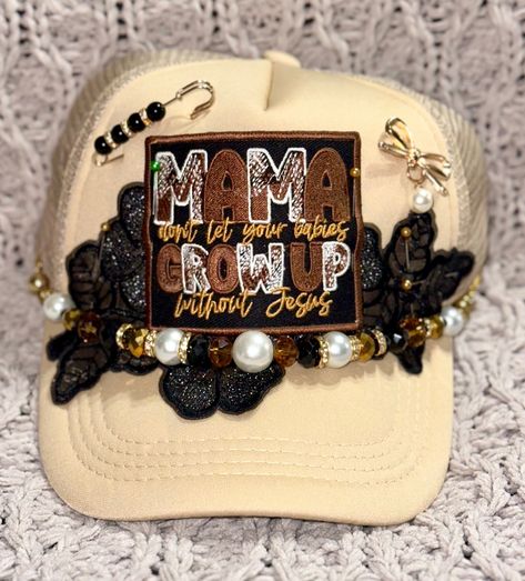 TRUCKER HAT Iron On Patches Boujee Hat Chain Black Lace Flower Mamas Don't Let Your Babies Grow Up Without Jesus Bow Pin Pearl Rhinestone  Khaki cap with pearl/black beaded hat chain, large black flower lace, a bow pin with a pearl dangle, a pin with black beads and the center patch says Mamas Don't Let Your Babies Grow Up Without Jesus. Hat Chain, Grow Up, Diy Hats, Rhinestone Accessories, Cheer Team Gifts, Statement Socks, Diy Clothes Hacks, Custom Trucker Hats, Diy Socks