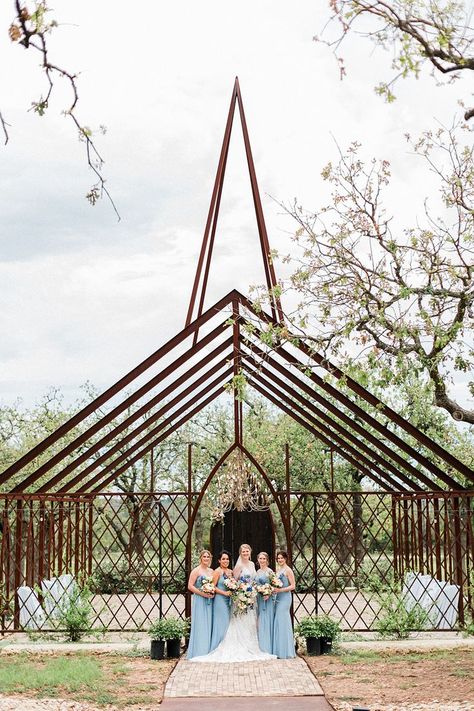 Legacy Ranch Wedding Chapel, Fredericksburg, Texas, open air wedding chapel, spring wedding, dusty blue bridesmaid dress with bright florals Open Air Chapel Wedding, Dusty Blue Bridesmaid Dress, Open Air Chapel, Open Air Wedding, Elk Photography, Dusty Blue Bridesmaid, Fredericksburg Texas, Dusty Blue Bridesmaid Dresses, Rainy Wedding