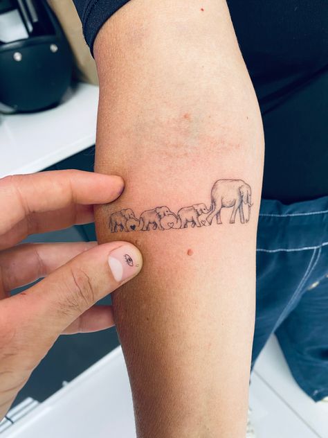 Elephant Meaning Tattoo, Elephant Chain Tattoo, 5 Elephant Family Tattoo, Four Elephants Tattoo, Elephant Tattoos For Mom, Fine Line Elephant Family Tattoo, 4 Elephants Tattoo, Elephant With Baby Tattoo, Elephant Family Tattoos For Women