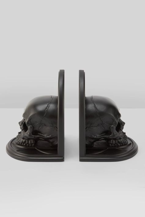 SKULL.- Statement black resin bookends.- Intricate sculpted details.- Set of two.- Width 10cm / 3.9".- Height 13.5cm / 5.3".- Length 10cm / 3.9".With KILLSTAR branding, 100% Resin. Imported. Goth Room Accessories, Skull Room Decor, Gothic Skull Decor, Gothic Decor Living Room, Goth Office Decor, Spooky Furniture, Killstar Home Decor, Killstar Home, Gothic Knick Knacks