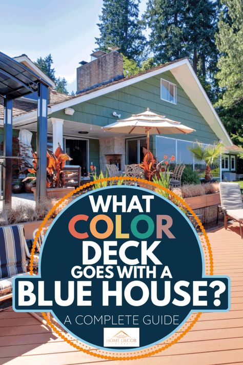 What Color Deck Goes With A Blue House? [A Complete Guide] - Home Decor Bliss Blue House Deck Color Ideas, White Blue Exterior House Colors, Front Porch Blue House, Deck With Blue House, Deck Stain Ideas For Blue House, Deck Stain Blue House, Dark Blue House With Deck, Deck Colors For Dark Blue House, Blue House With Front Porch