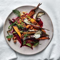 Roasted Carrots with Beet Puree, Goat Cheese, and Hazelnuts | Earthy carrots and beets meet toasty hazelnuts and tangy goat cheese in this substantial vegetable course. Get the recipe at Food & Wine. New Years Main Dish, Beet Puree Recipes, Haute Cuisine Recipes, Salad Butternut Squash, Beet Puree, Carrots Roasted, Hazelnut Recipes, Creamy Carrot Soup, Butternut Squash Puree