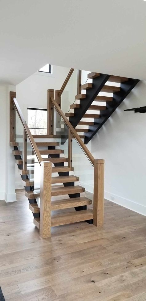 White Oak open tread glass panel stair case. White Oak handrail and newel posts. Painted stringers to match home aesthetic. Stairs With Glass Panels, Stair Paneling, Oak Handrail, Stair Posts, Stairs Renovation, Staircase Landing, Open Stairs, Stair Well, Timber Staircase