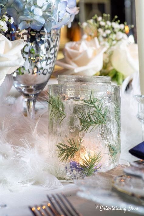 Gorgeous blue, white and gold winter table setting! These winter table decor ideas are so easy to do and will make any dinner party special. They would also work well for a boy's baby shower or a winter bridal shower. | Wedding Decorations Winter Wonderland Centerpieces, Winter Table Setting, Winter Table Decor, Winter Tablescapes, Mason Jar Candle Holders, Winter Bridal Showers, Winter Centerpieces, Jar Candle Holder, Winter Pins