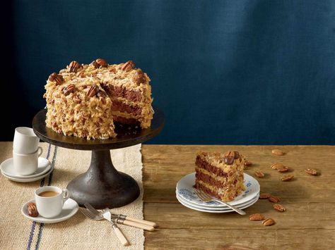 When you're baking to impress, turn to this moist German chocolate cake from scratch. It's hands down our best German chocolate cake recipe. Even Mama approves. Vintage Pasta, German Chocolate Cake Recipe, Coconut Pecan Frosting, Coconut Dessert, Coconut Pecan, Christmas Cake Recipes, Pecan Recipes, German Chocolate Cake, Best Chocolate Cake