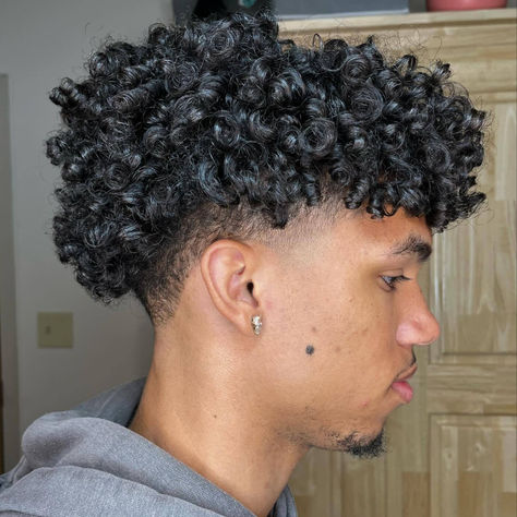 @rhi__o took this men's tapered haircut to new heights with defined, bouncy curls—

"a curly cut and style with the new @aveda be curly advanced curl perfecting primer and coil definer gel. check out that curl definition!! 🔥🙌🏼 curly cuts and styles with incredible products that are made with only the best plant-based ingredients and completely environmentally friendly" #BeCurly #MensHair #MensHairstyles #CurlyHair Aveda Be Curly, Curly Cuts, Men's Curly Hairstyles, Curly Cut, Curl Definition, Tapered Haircut, Hairstyle Inspo, Men's Hairstyles, Bouncy Curls