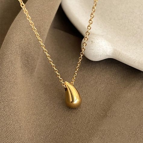 ig style water droplets titanium steel plating 18k gold plated pendant necklace https://trendy-jewels.eu/products/ig-style-water-droplets-titanium-steel-plating-18k-gold-plated-pendant-necklace Trendy Jewels #Hot Pendant Necklace Simple, Necklace Trendy, Drop Pendant Necklace, Water Droplets, Pearl Strands, Steel Plate, Drop Necklace, Drop Pendant, Womens Jewelry Necklace