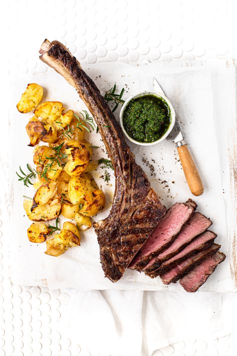 🥩🤤Meet the Tomahawk steak: a show-stopping, bone-in rib eye with a rich, beefy flavour and dramatic presentation.   Perfect for turning any meal into a special occasion, elevate your weekend by plating up this delicious bad boy, perfectly paired with crushed rosemary roast potatoes and zesty chimichurri. 👨🏼‍🍳😘  Simple, yet sophisticated - because sometimes the best meals are the ones that feel like a treat! 🍽️✨  #BarossaFineFoods #DinnerGoals #TomahawkSteak #FancyButEasy Meat Plating, Steak Food Styling, Steak Plating Presentation, Steak Plating, Steak Food Photography, Steak Photography Food Styling, Tomahawk Steak Photography, Ribeye Steak Photography, Gourmet Steak