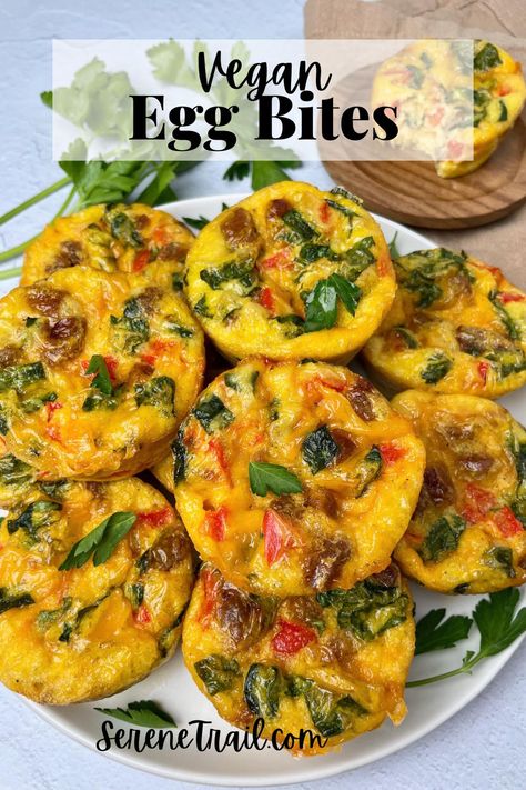 A plate with vegan egg muffins and herbs. Vegan Egg Cups, Vegan Tofu Egg Bites, Vegan Egg Bites Muffin Tins, Tofu Egg Bites, Vegan Egg Bites, Frittata Bites, Vegan Breakfast Muffins, Vegan Frittata, Veggie Bites