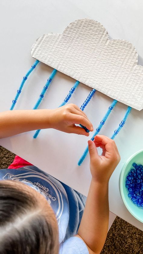 upandawayinprek on Instagram: Toddler Time: Rain Drop Beads 🌧 Make a little rain cloud out of cardboard, paint, and pipe cleaners and practice threading beads for some… Threading Beads, Preschool Weather, Weather Activities, Rain Cloud, Rain Clouds, Pipe Cleaners, Drop Beads, Pipe Cleaner, Rain Drops