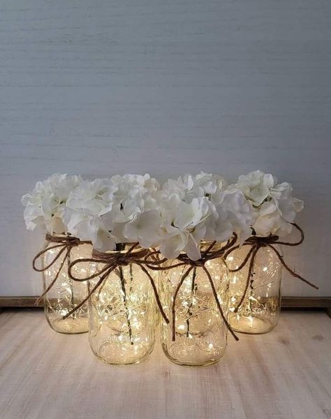 Mason Jar Lights Centerpiece, Daisy Centerpiece Ideas, Daisy Centerpieces, Rustic Romantic Wedding, Mason Jar Wedding Decor, Fairy Lights In A Jar, Valentines Brunch, 25 Wedding Anniversary Gifts, Lighted Centerpieces