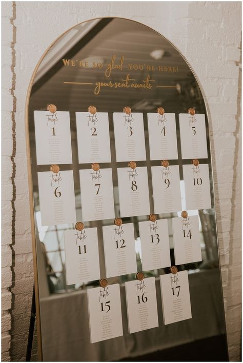 Say hello to your dream wedding seating chart! 👋 This sleek and modern mirror seating chart is the perfect way to add a touch of glam and sophistication to your special day. 🎉 Photo by Sydney Madison Creative Gold Mirror Guest List, Seating Chart Wedding Sayings, Find Your Seat Mirror, Lover Seating Chart, Wedding Seating Chart On Mirror, Seating Chart Sayings, Seating Chart Mirror Wedding, Seating Chart On Mirror, Mirror Seating Chart Wedding Diy