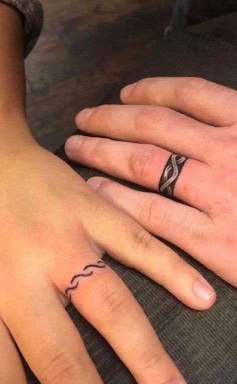 100 Unique Wedding Ring Tattoos You’ll Need to See - Tattoo Me Now Tattoo Wedding Bands, Couple Ring Finger Tattoos, Tatoo Ring, Wedding Ring Finger Tattoos, Wedding Ring Tattoos, Finger Tattoos For Couples, Ring Tattoo Designs, Wedding Band Tattoo, Tattoo Wedding