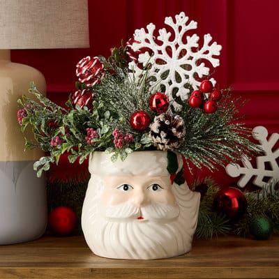 Santa Vase Arrangement | Projects | Michaels Santa Vase, Floral Arrangements Greenery, Santa Head, Christmas Floral Arrangements, Vase Arrangements, Centerpiece Ideas, Head Vase, Christmas Flowers, Christmas Tea