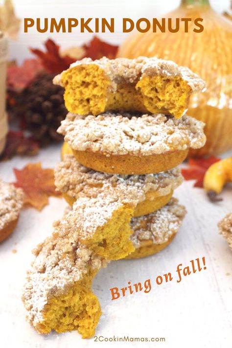 This Baked Pumpkin Donuts recipe is the perfect homemade treat for fall. Moist, full of spiced pumpkin flavor and topped with sweet cinnamon crumbs, you won't be able to stop at just one! They're quick and easy and make a great on-the-go breakfast or afternoon snack. #bakeddoughnuts #donutsrecipe #pumpkin #breakfast #homemade #fall #2CookinMamas Pumpkin Doughnuts, Pumpkin Donuts Recipe, Pumpkin Doughnut, Pumpkin Cheesecake Recipes, Yummy Fall Recipes, Nut Recipes, Spiced Pumpkin, Afternoon Snack, Baked Donuts