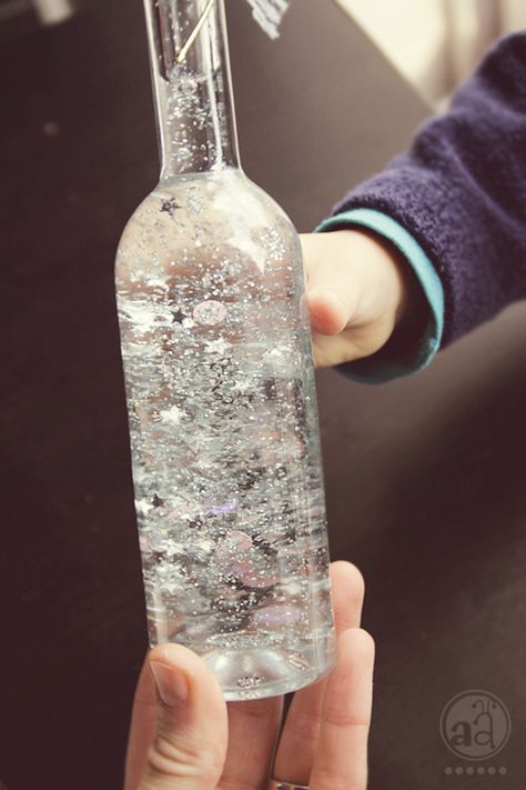 DIY Magic bottles—fill with distilled water, glycerin drops, glitter flakes, sequins, light plastic beads - anything that sparkles and is light enough to float around. #Glitter_Bottles #Kids #Crafts Magic Bottles, Glitter Flake, Distilled Water, Bottles And Jars, Plastic Beads, Easy Diy Projects, Diy Projects To Try, Bottles Decoration, Fun Crafts