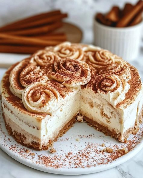 This Cinnamon Roll Cheesecake is the ultimate indulgence for dessert lovers, combining the best of two worlds. With a rich graham cracker crust, creamy cheesecake filling, and cinnamon swirl throughout, ... Read more Cinnamon Roll Cheesecake With Cream Cheese Icing, Cinnamoroll Cheesecake, Cinnamon Roll Cheesecake Recipes, Cheesecake For Two, Cinnamon Roll Crust, Gooey Desserts, Roll Cheesecake, Cinnamon Biscuits, Cinnamon Roll Cheesecake