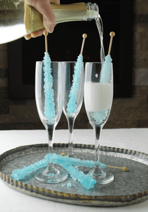 25 New Year's Eve Party Adult Drinks: High Spirits | Decor Dolphin Rock Candy Champagne, Diy Rock Candy, Fun Alcoholic Drinks, 21 Dinner, New Years Eve Drinks, New Years Eve Party Ideas Food, Ice Party, Winter Party Themes, Fun Drinks Alcohol