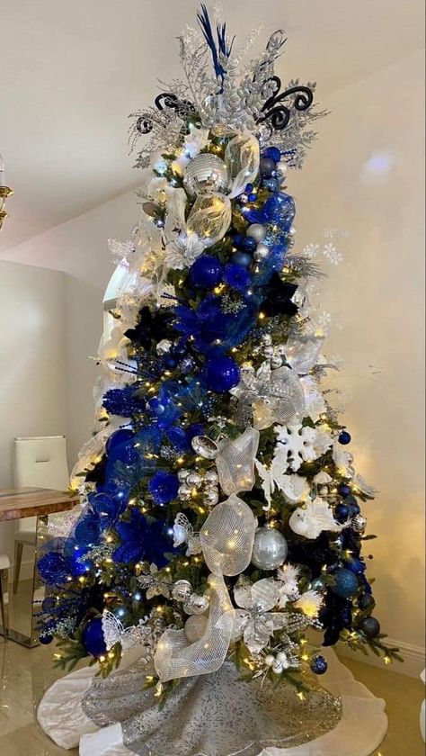 Turquoise Tree Christmas, White And Light Blue Christmas Tree, White And Blue Tree Christmas, Navy White And Silver Christmas Tree, Christmas Tree Blue And Silver Ideas Decorations, Silver And Navy Christmas Tree, Royal Blue And Silver Christmas Tree, Blue Sliver White Christmas Tree Decor, Christmas Decor Ideas Blue And White