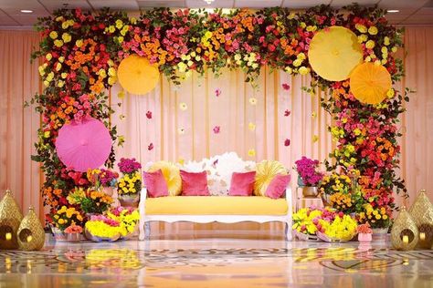 CHEZ ROSE FLORAL DESIGNS on Instagram: "Colorful Summer vibes 💕 . . #mehndi #mehndinight #colorful #mehndidesign #mehndidecor #mehndistage #chezrosefloraldesigns #teamchezrose #floraldesign #stagedesign #event #decor #design #beautiful #mehndilove #summervibes #eventdecor #mehndilook #eventdesign" Mehandi Event Decoration, Mehendi Event Decor, Colorful Sangeet Decor, Mehndi Backdrop Stage Decorations, Mehandi Decoration Indian Weddings, Mayra Function Decoration, Mehndi Function Decoration At Home, Mehendi Event Decoration, Mehndi Setup Decor