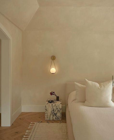 A place of calm ~ painted with Bauwerk colour Mykonos . “The primary bedroom was designed to be a serene retreat, with the softness of Bauwerk Limewash walls, warmth of European white oak floors, and layered neutrals that allow the outdoors that surround it to really sing.” Design and photography @johanna.andruchovici Limewash application @maximum_ron #minimalistdesign #earthytone #handcraftedfinish #naturalliving #softpalette #texturedwalls #bauwerkcolour #bauwerkmykonos Owners Bedroom, Limewash Walls, European White Oak Floors, Washing Walls, Paint Color Inspiration, White Oak Floors, Accent Wall Bedroom, Attic Bedroom, Bedroom Ceiling