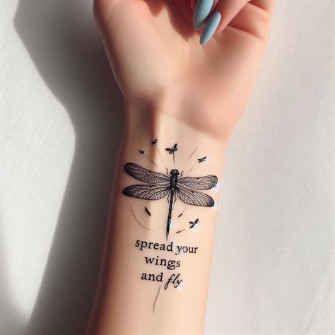 15 Dragonfly Tattoo Ideas to Represent Change and Transformation 9 Dragon Fly Tattoos For Women, Tattoos Dragonfly, Dragon Fly Memorial Tattoo, Dragonfly Name Tattoo, Dragonfly Tattoo In Memory Of, Tattoo Dragonfly, Dragonfly Tattoo Ideas, Dragonfly Remembrance Tattoo, Dragonfly Meaning Spiritual Tattoo Ideas