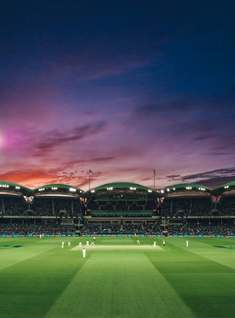 As the sun sets, so does the test match between England and Australia. Adelaide Oval, South Australia.. Download this photo by Marcus Wallis on Unsplash Cricket Stadium Wallpaper, Stadium Wallpaper, Expensive Art, Saint Thomas, Cricket Games, Glass Bottom Boat, German Village, Belize City, Cricket Wallpapers