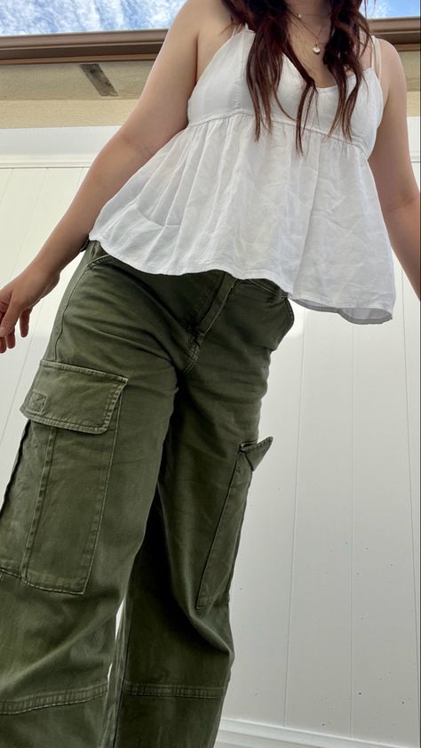 Green cargo pants with flowy babydoll top #fashion #aesthetic #cargopantsoutfit Green Cargo Aesthetic, Cargo With Kurti, Kurti With Cargo Pants, Green Denim Pants Outfit, Green Cargo Pant Outfit, How To Style Green Cargo Pants, Nina Core, Cargo Pants Outfit Summer, Cargo Outfits Women