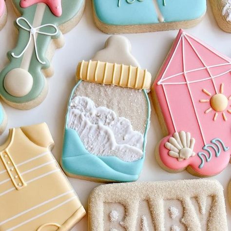 Katie | Los Angeles Custom Cookies on Instagram: "Beach Baby🐚🌊☀️⁠
.⁠
.⁠
.⁠
#beachbabyshower #babyshowercookies #babyshowercookieset #losangelescookies #losangelescustomcookies #sugarcookie #sugarcookiedecorating #sugarcookiesofinstagram #customsugarcookies #thesweetpeacookieco #satisfyingvideos #cookievideo #glendalecookies #glendaleca" Beach Baby Shower Cookies, Baby On Board Cookies, Beach Gender Reveal, Fondant Biscuits, Surfer Baby Shower, Surfer Baby, Gender Reveal Cookies, Beach Baby Showers, Royal Iced Cookies