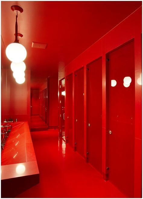 TSG Blog: Take a Shine to It - This red bathroom was designed by NICOLE HOLLIS for Hall Winery in St. Helena, California. The sheen is not lacquer but, in this case: red milestone walls, countertops, and doors, and “Red” from Benjamin Moore. The modern light fixtures from Castore by Artemide are the just the thing to get those red walls glimmering from top to bottom. Nicole Hollis, Mark Adams, Architecture Jobs, Bathroom Table, Red Bathroom, Interior Architects, Restroom Design, Public Bathrooms, Timeless Interiors