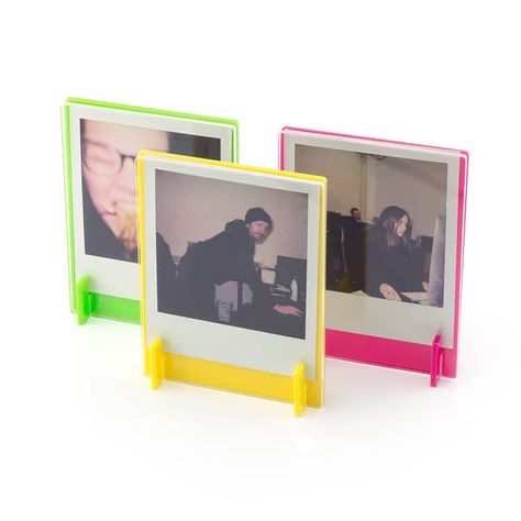 12 Creative Ways and Frames to Display Your Instax and Polaroid Snaps Photo Frame Stand, Polaroid Original, Picture Coasters, Acrylic Photo Prints, Picture Frames Standing, Polaroid 600, Reel Ideas, Clip Frame, Polaroid Frame