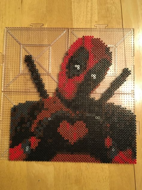 Deadpool Pearl Beads, Wwe Perler Beads, Pearl Beads Pattern Pixel Art, Venom Perler Beads, Perler Bead Patterns Marvel, Pearler Bead Design Aesthetic, Deadpool Perler Beads, Pixel Art Creepy, Marvel Perler Bead Patterns