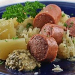 Alsatian Pork and Sauerkraut - Allrecipes.com Use golden or red potatoes instead of russet Pork And Sauerkraut Recipe, Pork And Sauerkraut, Sauerkraut Recipe, French Potatoes, Traditional French Recipes, Cubed Sweet Potatoes, Fancy Dishes, Grilled Ham, Kielbasa Sausage