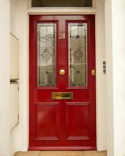 Classic red Victorian door fitted with stained glass in London. Product design and service based upon over 40 years experience 0208 368 1664 Victorian Front Door, Purple Front Doors, Front Doors Uk, Victorian Doors, Victorian Front Doors, Yellow Front Doors, Coloured Lenses, Front Door Styles, Red Front Door