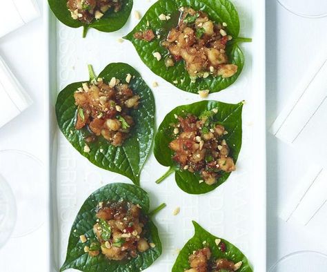 Serve these spicy, Asian-inspired sticky prawns on betel leaves for an elegant, mouth-watering canapé. Smoked Salmon Blinis, Betel Leaf, Asian Appetizers, Marion's Kitchen, Peanut Recipes, Tea Party Food, Thai Dishes, Food Concept, Latest Recipe