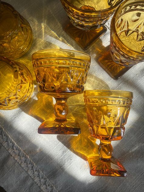 "Gorgeous amber goblets. Colony Park Lane. Two sizes available. 4\" and 4 1/2\". Perfect vintage condition with no chips or cracks." Colored Glassware Antique, Amber Glass Decor, Vintage Colored Glassware, Amber Glassware Wedding Table, Vintage Glasswear, Amber Dinnerware, Mismatched Glassware, Thrifted Glassware, Thrifted Kitchen