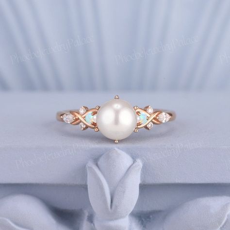 Art Deco Akoya Pearl&Opal Engagement Ring Vintage Solid Gold Diamond Wedding Rings for Women Vintage Twist Minimalist Ring Anniversary Gift PRODUCT SUMMARY Metal Type: yellow, white or rose solid 10K/14k or 18k gold. Size: All sizes are available, contact me if they do not contain the size you want in the drop-down menu. ☪☪Engagement ring ⚜Center Stone -Natural Akoya Pearl Cut - Round Size - 6 mm ⚜Side Stone 1 - Moissanite or Natural Diamonds Cut - Round Shaped Weight - 0.256ct Clarity - SI-VS Color- G-H ⚜Side Stone 2 - Natural White Opal with Fire Color Cut -Round Shaped Weight - 0.01ct ⚜Band width - 1.6 mm IMPORTANT INFORMATION  ☪Shipping ⚜It usually takes 2-3 weeks for production and 3-5 days for shipping to most US destinations. Free shipping within US. ⚜If you want to receive your rin Diamond And Pearl Engagement Ring Vintage, Gold Ring With Pearl, Diamond Wedding Rings For Women, Opal Engagement Ring Vintage, Pearl Engagement Rings, Victorian Wedding Ring, Vintage Opal Engagement Ring, Pearl Wedding Ring, Gold Diamond Wedding Rings