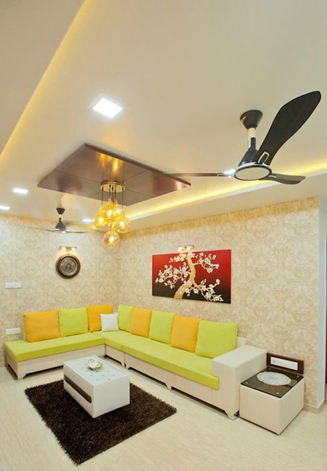 Beautiful and functional design for a 1200 sq ft home in Pune | homify Ceiling Design Living Room With 2 Fans, Hall Celling Design Modern With 2 Fans, False Ceiling Living Room With 2 Fans, Pop Design For Hall With 2 Fans, Living Room Designs Indian, House Ceiling, Indian Living Rooms, House Redesign, Pop Ceiling Design