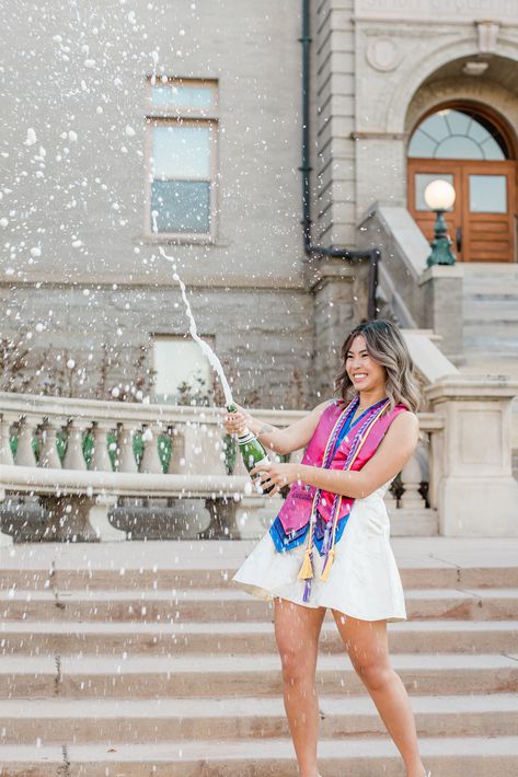 Graduation Poses Champagne, Graduation Pictures Champagne Pop, College Grad Pictures Photo Ideas, Graduation Pictures With Stole, Popping Champagne Pictures Graduation, Culinary Graduation Pictures, College Graduation Pose Ideas, Cap And Gown College Pictures, Nursing School Graduation Pictures With Family