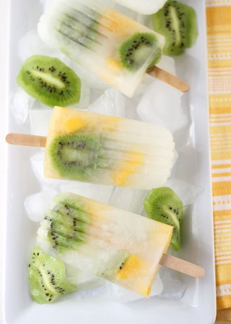 Refreshing Mango Kiwi Lemonade Popsicles that are perfect to cool down on any summer night! Blueberry Coffee Cake Muffins, Kiwi Lemonade, Kiwi Popsicles, Ice Lolly Recipes, Fruit Popsicle Recipes, Juice Recipes For Kids, Frozen Deserts, Lemonade Popsicles, Frozen Cocktail