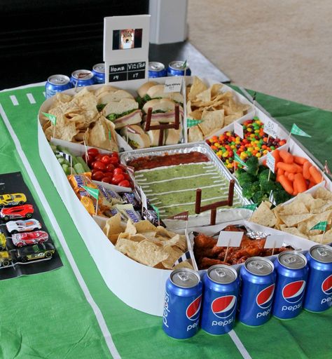 Snack Stadium Tutorial.  Learn how to make this super easy Snack Stadium with working jumbotron. #GameDayGlory #ad Snack Stadium Diy, Super Bowl Snack Stadium, Snack Stadium, Game Night Food, Healthy Superbowl Snacks, Football Snacks, Diy Snacks, Night Food, Superbowl Snacks