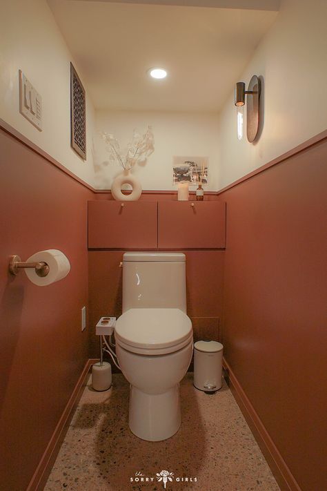 If you saw my spa bathroom makeover, you might have noticed that my toilet was nowhere to be found - that's because it's actually in a separate small space! I madeover my small powder room / water closet / toilet room (whatever you want to call it!) to be a vintage-inspired dark and moody space. I used DIY cabinets and trim with a terracotta accent and modern decor touches to make it the serence room I was dreaming it to be. Click to see how I did it all! Water Closet Decor, Terracotta Bathroom, Sideboard Upcycle, The Sorry Girls, Toilet Room Decor, Small Toilet Room, Powder Room Makeover, Diy Toilet, Guest Toilet