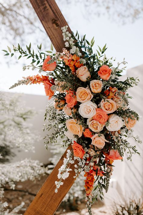 Hexagon wedding ceremony arch with coral florals and greenery (Venue: @terceroweddings // Design: @azflowerfix) #coral #wedding #peonies #roses #outdoorwedding #azwedding Coral And Terracotta Wedding, Coral Flower Bouquet Wedding, Wedding Flowers Design, Hexagon Wedding Arch Terracotta, Peach Arbor Flowers, Archway Wedding Flowers, Trending Wedding Flowers 2023, Wedding Arch Orange Flowers, Wedding Arch Orange