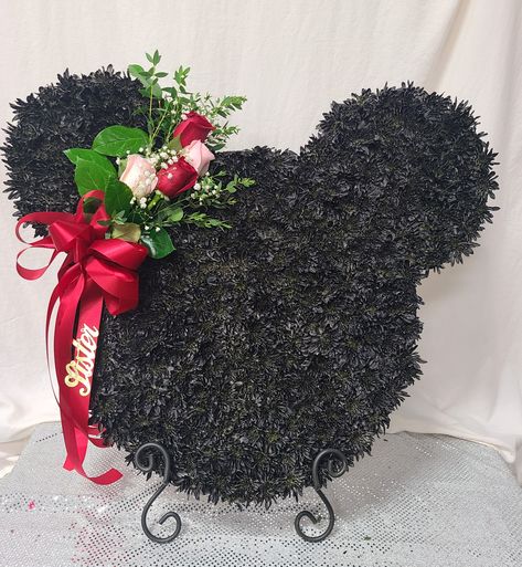 This silhouette of Mickey is made with White pomps sprayed black. Mickey Mouse Flower Arrangement, Mickey Head, Flowers Arrangements, Cake Flavors, Faux Flowers, Floral Arrangements, Feathers, Flower Arrangements, Christmas Wreaths