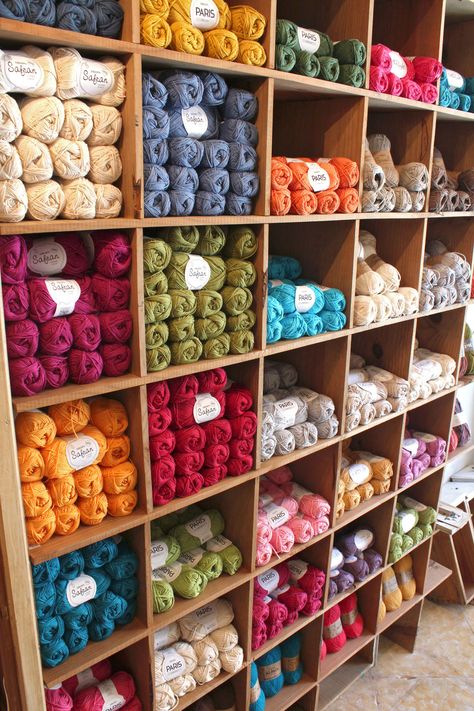 A big warm #dropsdesign welcome to our new store Tricotela located in Seville city centre. #newshop #yarn Fabric Shop Display, Yarn Display, Seed Craft, Knitting Room, Yarn Creations, Wool Fashion, Yarn Organization, Local Yarn Shop, Yarn Storage