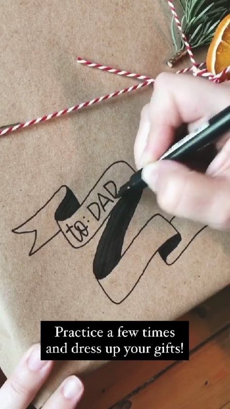 whitegalleryandco on Instagram: Step by step banner for a fun way to dress up your gifts!! By @pandhchalk Follow them for more art inspiration! #whitegalleryandco if you… Craft Paper Christmas Wrapping Drawing, Labeling Christmas Presents, How To Draw A Bow On A Present, Christmas Gift Writing, Present Name Tags Diy, How To Draw Ribbon Banner Step By Step, Decorating Brown Wrapping Paper, Diy Name Tags For Gifts, Diy Name Tags For Christmas Gifts