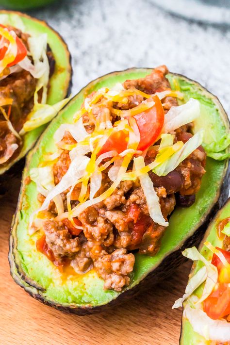 These Taco Stuffed Avocados are fun and nutritious way to enjoy Taco Tuesday dinner! Fresh avocados filled with all of your favorite taco fixings. Mediterranean Casserole, Best Ground Turkey Recipes, Asian Turkey Lettuce Wraps, Turkey Mediterranean, Avocado Stuffed, Asian Turkey, Stuffed Avocados, Avocado Taco, Beef Chili Recipe